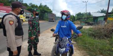 PPKM Darurat, Polsek Hanau Terus Lakukan Penyekatan