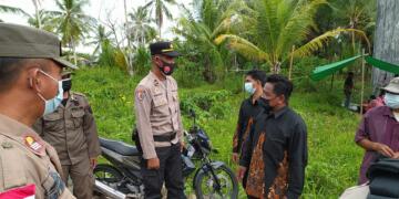 Tim Yustisi Polres Seruyan Bersama Sat Pol PP Berikan Himbauan Prokes