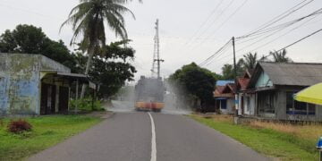 Sat Sabhara Semprotkan Disinfektan Gunakan Rantis Armoured Water Cannon (AWC)