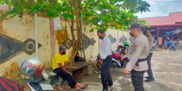 Tim Yustisi Polres Seruyan Sampaikan Prokes ke Warga Kuala Pembuang