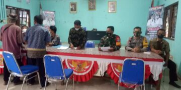 Personil Polsek Hanau Amankan Penyaluran BLT-DD