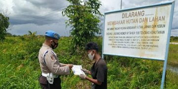Anggota Polsek Seruyan Hilir Terus Sosialisasi Larangan Karhutla
