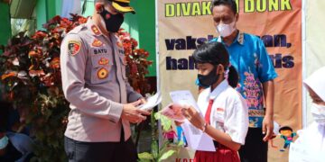 Kapolres Seruyan Bagikan Masker Kepada Murid SDN 1 Desa Sungai Undang