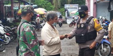 Patroli Gabungan Polsek Serhil dan Koramil Untuk Penegakkan Prokes Covid-19