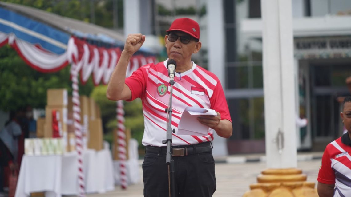 Kepala Dinas Pemuda dan Olahraga Prov. Kalteng Hamka saat membacakan sambutan tertulis Menpora RI Zainudin Amali