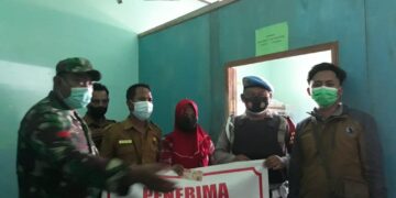 Polisi Kawal Pendistribusian BLT-DD ke Warga