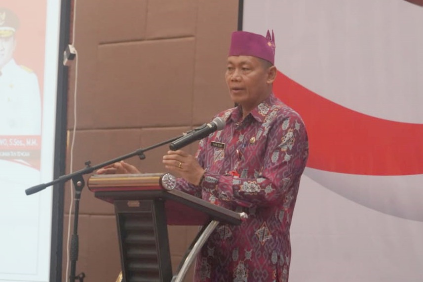 Sahli Gubernur Kalteng Bidang Ekonomi, Keuangan, dan Pembangunan Yuas Elko bacakan sambutan