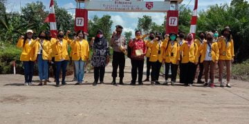 Personel Polsek Sebangau Kuala Hadiri Penilaian dan Penyerahan Hadiah Lomba Pemasangan Gapura
