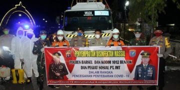 Malam Hari, Water Canon dan Enam Truk Tangki Basahi Buntok dengan Disinfektan