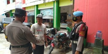 Satgas Operasi Yustisi Polres Seruyan Tegur Pelanggar Prokes di Pasar Saik