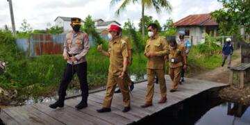 Kapolres Seruyan dan Tim Satgas Covid-19 Apel Bersama dan Penyerahan Bansos