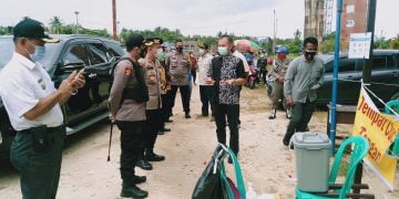 Pantau Pencoblosan, Kapolres Gumas Pastikan Penerapan Prokes di TPS Berjalan Baik