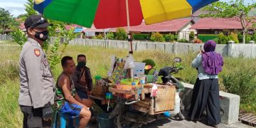 Cegah Covid-19, Bhabinkamtibmas Polsek Sepang Imbau Disiplin Prokes