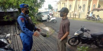 Satpolairud Polres Seruyan Ajak Masyarakat Taati Protokol Kesehatan