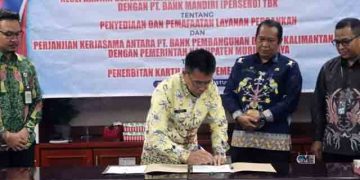 Pj Bupati Mura Teken MoU dengan Pihak Bank