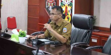 Asisten I Setda Hadiri Zoom Meeting Asistensi Pendanaan Pengamanan Pilkada