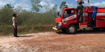 Polsek Hanau Bersama Tim Gabungan Lakukan Pendinginan Lahan