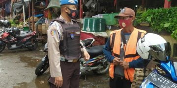 Polsek Seruyan Hilir Sosialisasi Prokes Covid di Pusat Pasar