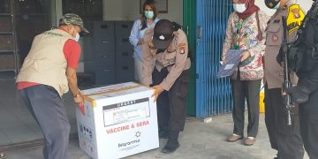 Polres Gumas Kawal Pendsitribusian Vaksin Covid-19 Tahap II