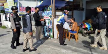 Brimob Kalteng Gencar Patroli Yustisi dan Sosialisasi SE Walikota Palangka Raya