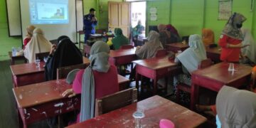 Marnit Samuda Dampingi Pelaksanaan Sosialisasi Vaksinasi Covid-19