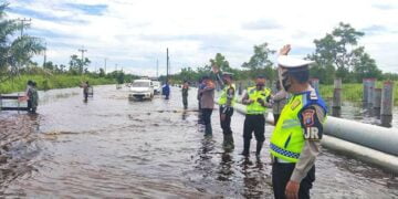 Banjir di Bukit Rawi, Polda Kalteng Imbau Pengendara Selalu Waspada