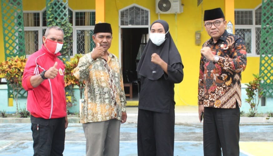 Feby Aura Pajriani (dua kanan) berhasil wakili Kalteng dalam cabang olahraga Pencak Silat di Popnas Palembang 2021. FOTO : mmc.kalteng.